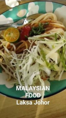  Laksa Johor: Täynnä makuja ja aromaatteja, tämä Malesian herkku on varmasti unohtumaton kokemus!